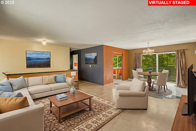 14173 NW Grandview Pl, Banks, OR 97106 - living room with a chandelier and light wood-type flooring