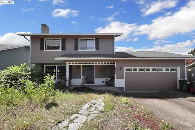 1168 Risden Pl, Eugene, OR 97404 - traditional-style house with asphalt driveway, covered porch, a chimney, and an attached garage