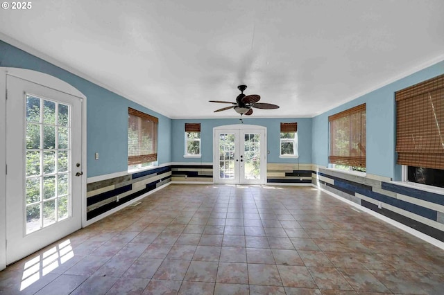 1168 Risden Pl, Eugene, OR 97404 - unfurnished living room with french doors, plenty of natural light, tile patterned floors, and ceiling fan