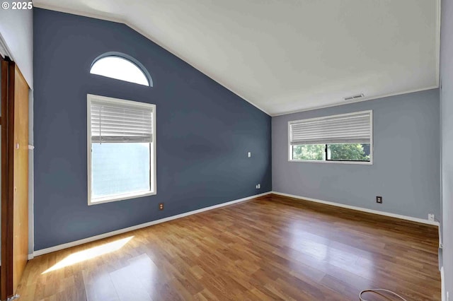 1168 Risden Pl, Eugene, OR 97404 - empty room with lofted ceiling and wood finished floors
