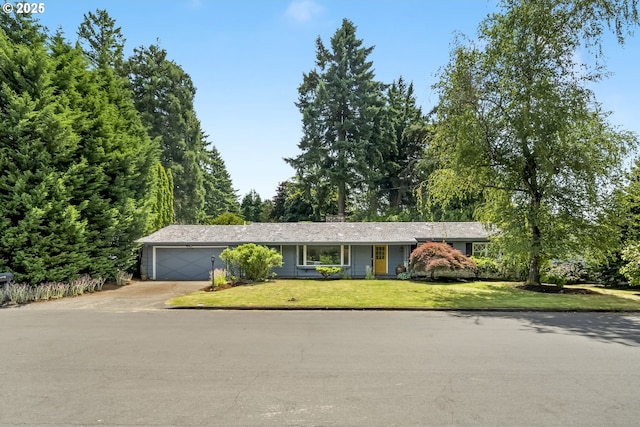 1070 SW Portola Ave, Portland, OR 97225 - ranch-style house with driveway, a garage, and a front lawn