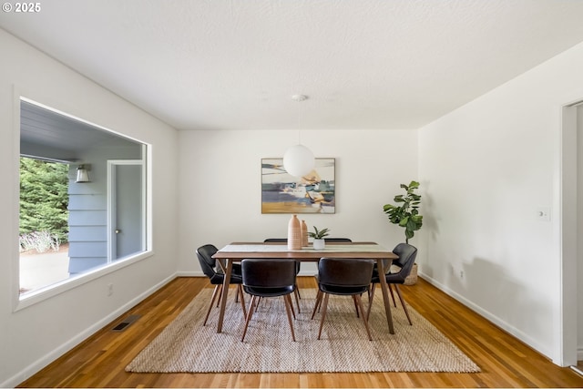 1070 SW Portola Ave, Portland, OR 97225 - dining room with wood finished floors and baseboards