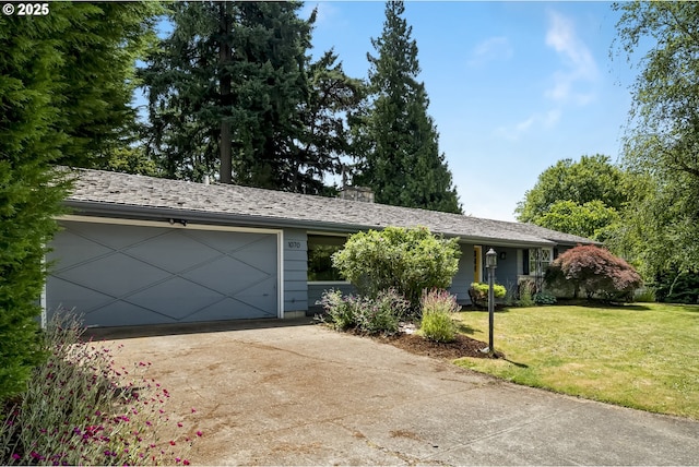1070 SW Portola Ave, Portland, OR 97225 - single story home featuring driveway, a front lawn, a chimney, and an attached garage
