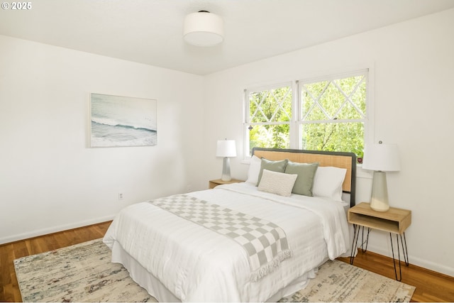 1070 SW Portola Ave, Portland, OR 97225 - bedroom featuring baseboards and wood finished floors