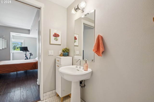 bathroom with baseboards