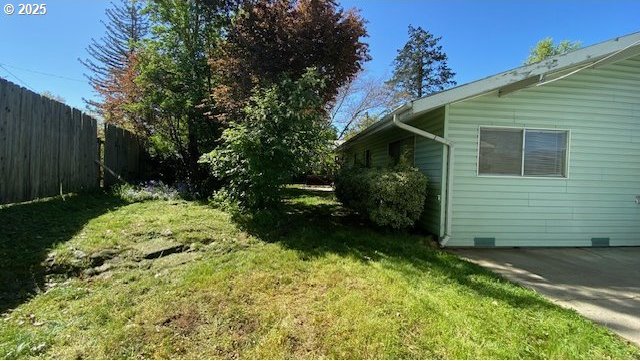 view of yard featuring fence