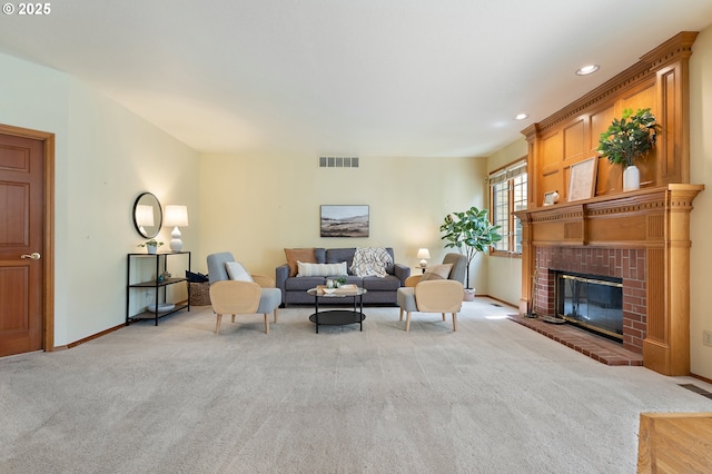 5844 Ridgetop Ct, Lake Oswego, OR 97035 - living area with light colored carpet, recessed lighting, and a fireplace