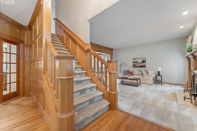 5844 Ridgetop Ct, Lake Oswego, OR 97035 - stairs with wood finished floors, recessed lighting, and a fireplace