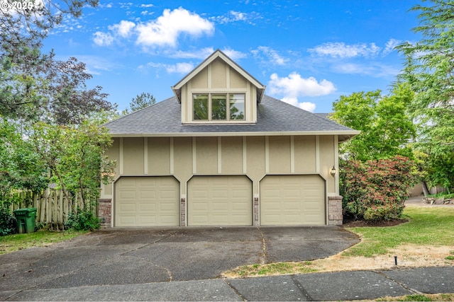 5844 Ridgetop Ct, Lake Oswego, OR 97035 - view of front of home with roof with shingles, board and batten siding, and asphalt driveway