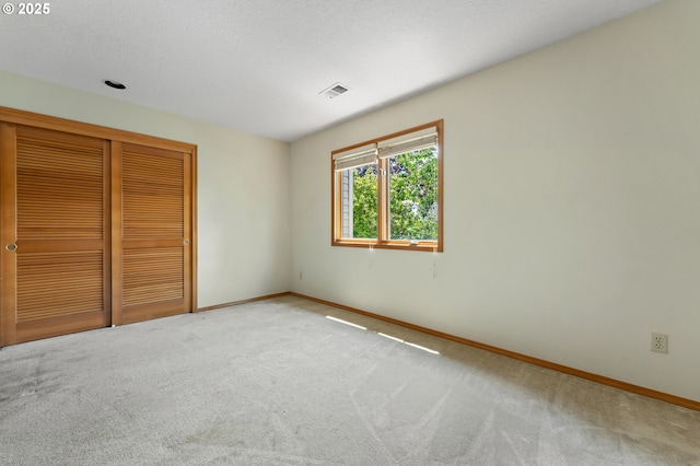 5844 Ridgetop Ct, Lake Oswego, OR 97035 - unfurnished bedroom featuring carpet flooring and a closet