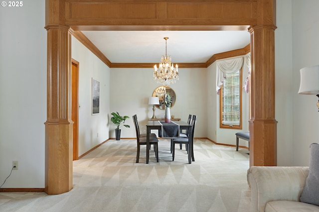5844 Ridgetop Ct, Lake Oswego, OR 97035 - dining room featuring decorative columns, a chandelier, ornamental molding, and light carpet