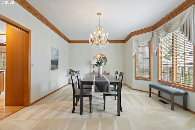 5844 Ridgetop Ct, Lake Oswego, OR 97035 - dining room featuring a chandelier, ornamental molding, light carpet, and healthy amount of natural light