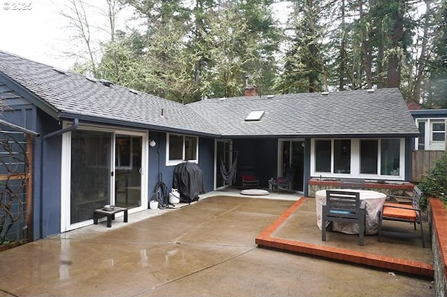 4768 Manzanita St, Eugene, OR 97405 - rear view of property with roof with shingles, a patio area, and a chimney