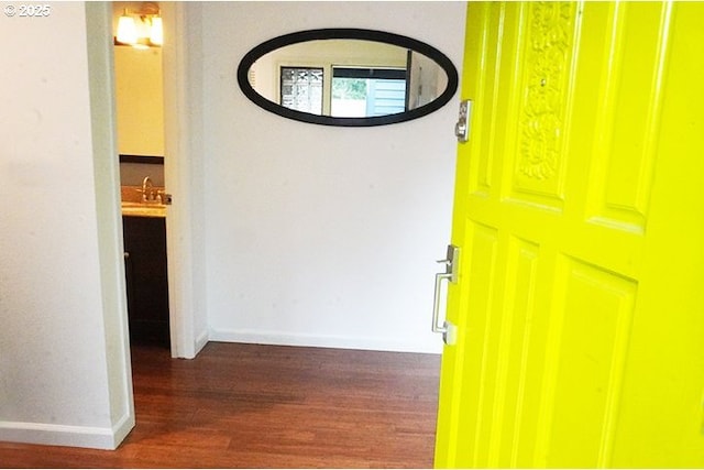 4768 Manzanita St, Eugene, OR 97405 - hallway featuring wood finished floors, baseboards, and a sink