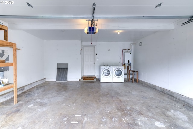 garage with washer and dryer and a garage door opener