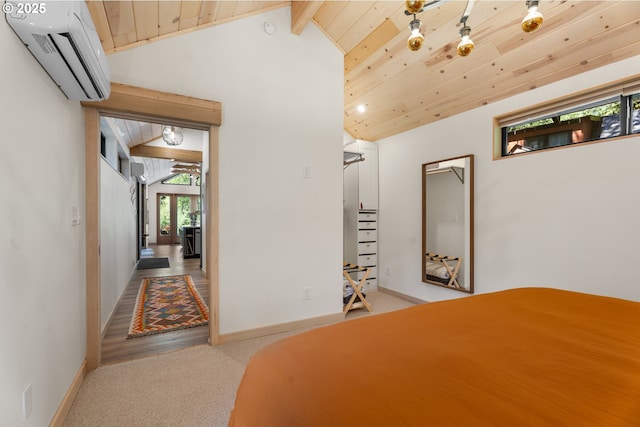 bedroom featuring a wall mounted AC, wooden ceiling, carpet floors, and baseboards