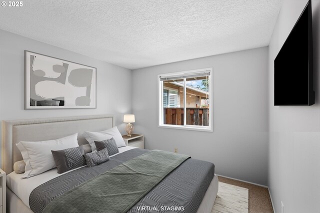 5016 SW Normandy Pl, Beaverton, OR 97005 - bedroom with carpet flooring, a textured ceiling, and baseboards