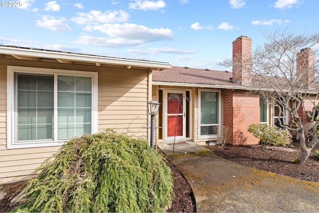 5016 SW Normandy Pl, Beaverton, OR 97005 - property entrance with a chimney