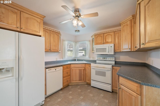 1108 4th St, Tillamook, OR 97141 - kitchen featuring white appliances, dark countertops, a ceiling fan, and light brown cabinets
