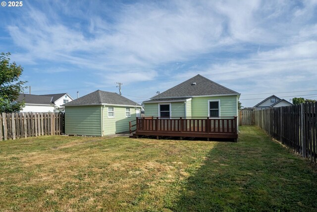 1108 4th St, Tillamook, OR 97141 - rear view of property with a fenced backyard, a wooden deck, and roof with shingles