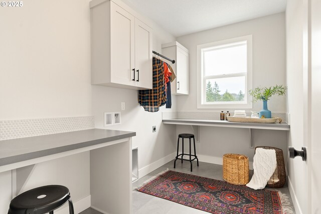 2876 NW 114th Ter, Portland, OR 97229 - laundry room featuring electric dryer hookup, cabinet space, and washer hookup