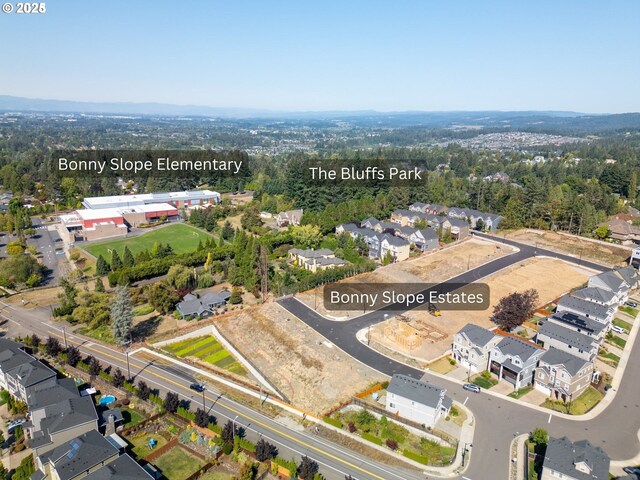 2876 NW 114th Ter, Portland, OR 97229 - aerial view of property and surrounding area with nearby suburban area and a forest