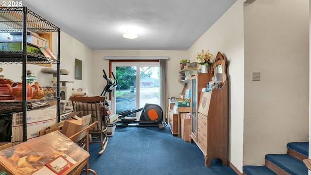 workout room with dark carpet