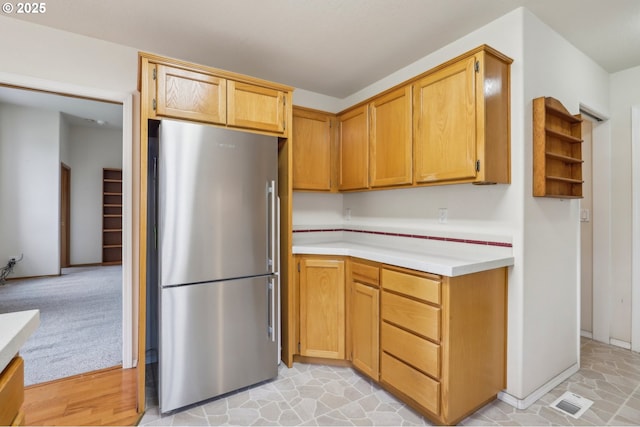 33333 Adam Ct, Scappoose, OR 97056 - kitchen featuring freestanding refrigerator and light countertops