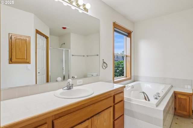 33333 Adam Ct, Scappoose, OR 97056 - bathroom featuring vanity, a garden tub, and a stall shower