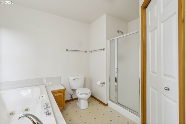 33333 Adam Ct, Scappoose, OR 97056 - full bath with a stall shower, a jetted tub, toilet, and baseboards