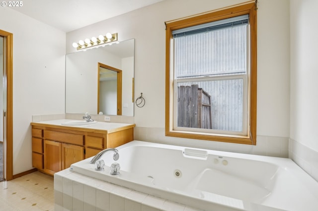33333 Adam Ct, Scappoose, OR 97056 - bathroom featuring a tub with jets and vanity