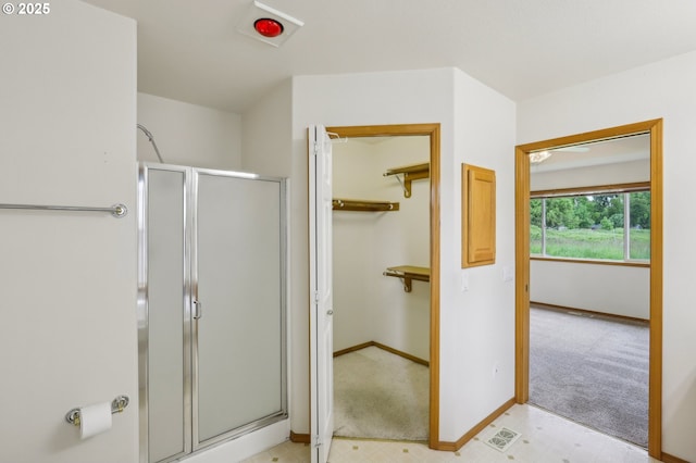 33333 Adam Ct, Scappoose, OR 97056 - bathroom featuring a shower stall and baseboards