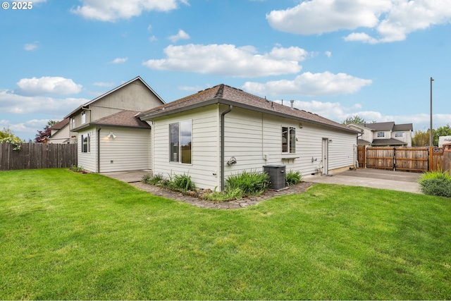 33333 Adam Ct, Scappoose, OR 97056 - back of property with a patio and roof with shingles