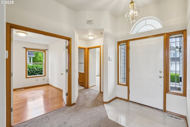 33333 Adam Ct, Scappoose, OR 97056 - entryway with a chandelier and baseboards