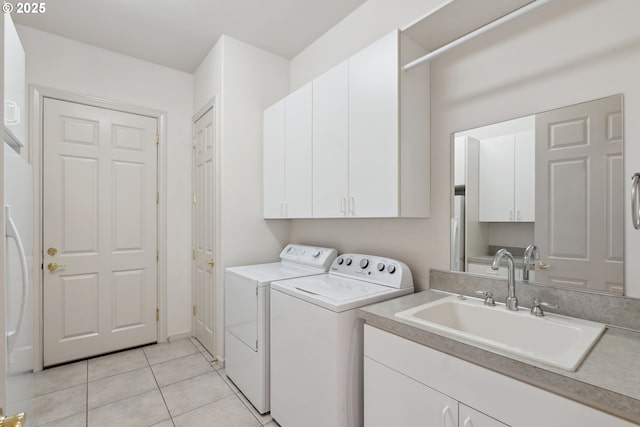 1508 NW 151st St, Vancouver, WA 98685 - laundry area with independent washer and dryer, cabinet space, and light tile patterned flooring