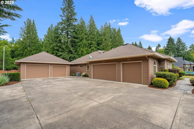 1508 NW 151st St, Vancouver, WA 98685 - view of front of house featuring a shingled roof and a garage