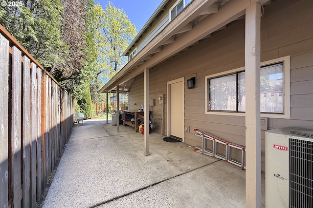 view of patio featuring central AC and a fenced backyard