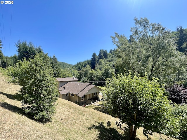 96343 Coos-Sumner Ln, Coos Bay, OR 97420 - view of subject property featuring a heavily wooded area