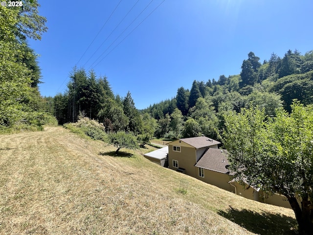 96343 Coos-Sumner Ln, Coos Bay, OR 97420 - drone / aerial view of a heavily wooded area