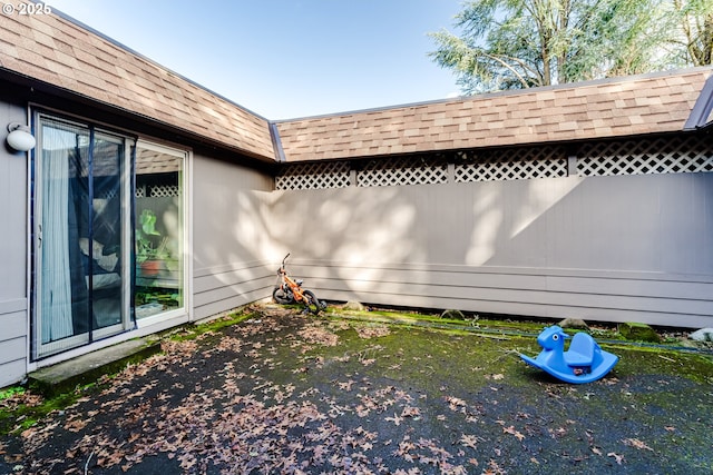 view of home's exterior featuring a shingled roof