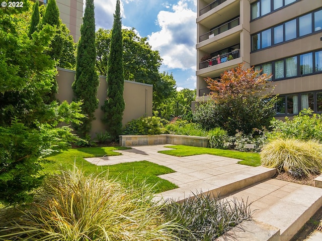 view of home's community featuring a patio