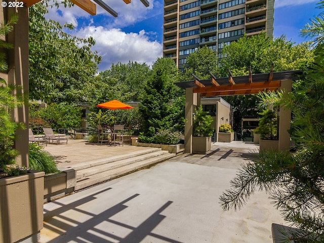 view of patio featuring a pergola