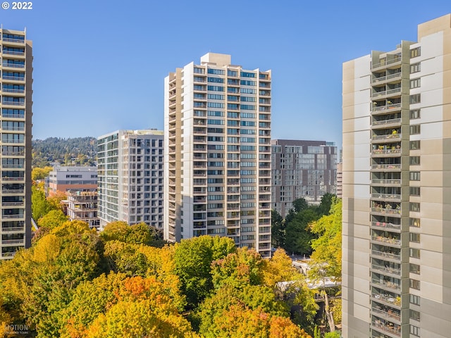 view of building exterior featuring a city view