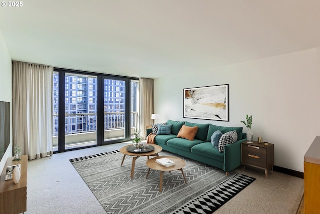 living area with expansive windows and baseboards