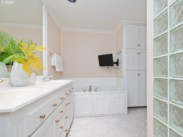 bathroom featuring crown molding, a bathing tub, tile patterned floors, and vanity