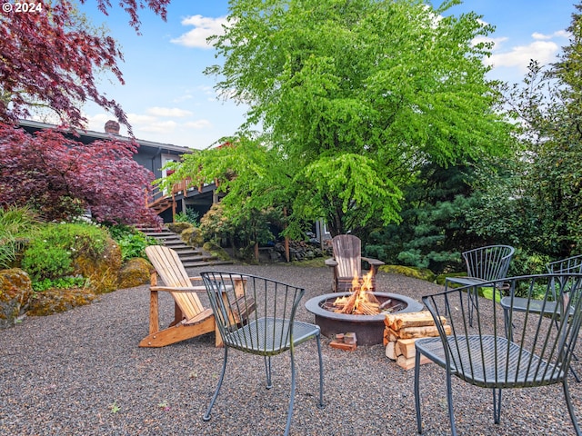 view of patio featuring a fire pit