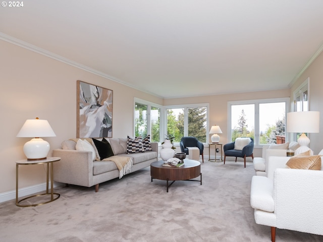 living room with ornamental molding, light colored carpet, and plenty of natural light