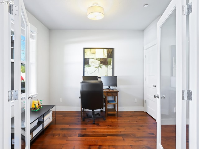 office with dark hardwood / wood-style flooring