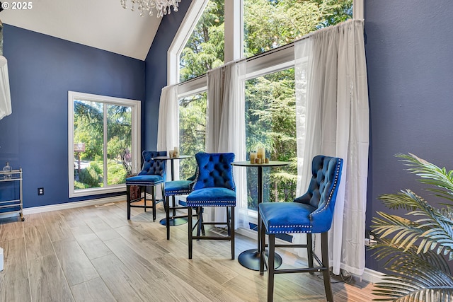 2672 SE Vista Way, Gresham, OR 97080 - living area with high vaulted ceiling, wood finished floors, and baseboards