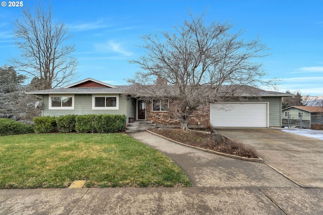 ranch-style home with concrete driveway, brick siding, an attached garage, and a front lawn